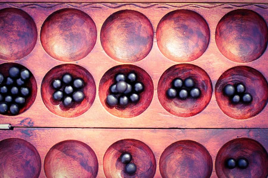 Kigali: Learn Rwandan Table Game (IGISORO) with a Local - Taking home a handcrafted Igisoro board