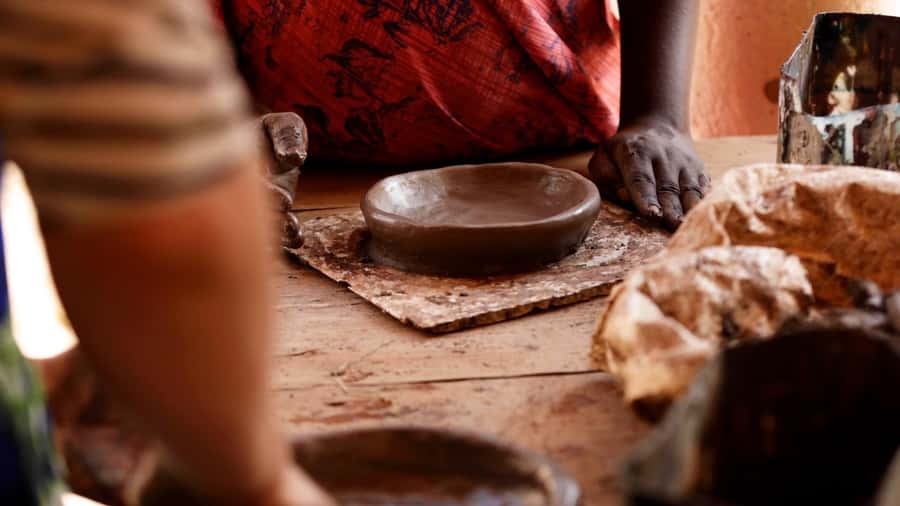 Kigali: Traditional Kubumba Pottery Making with Local Women - Shaping clay with Mariam and Gloria